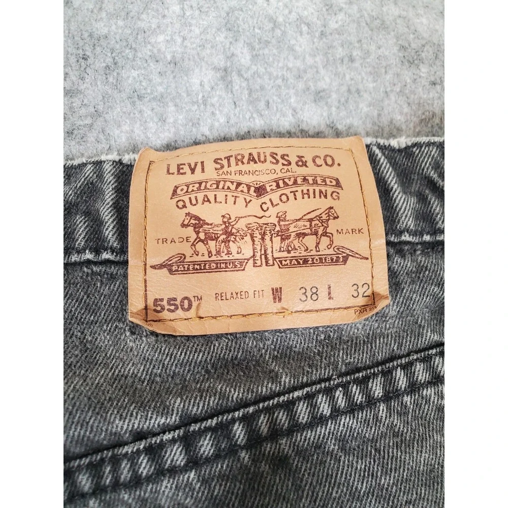 VINTAGE Levi's 550 Orange Tab Jeans Fits 36x31 Mens Black Relaxed Fit 90s Faded